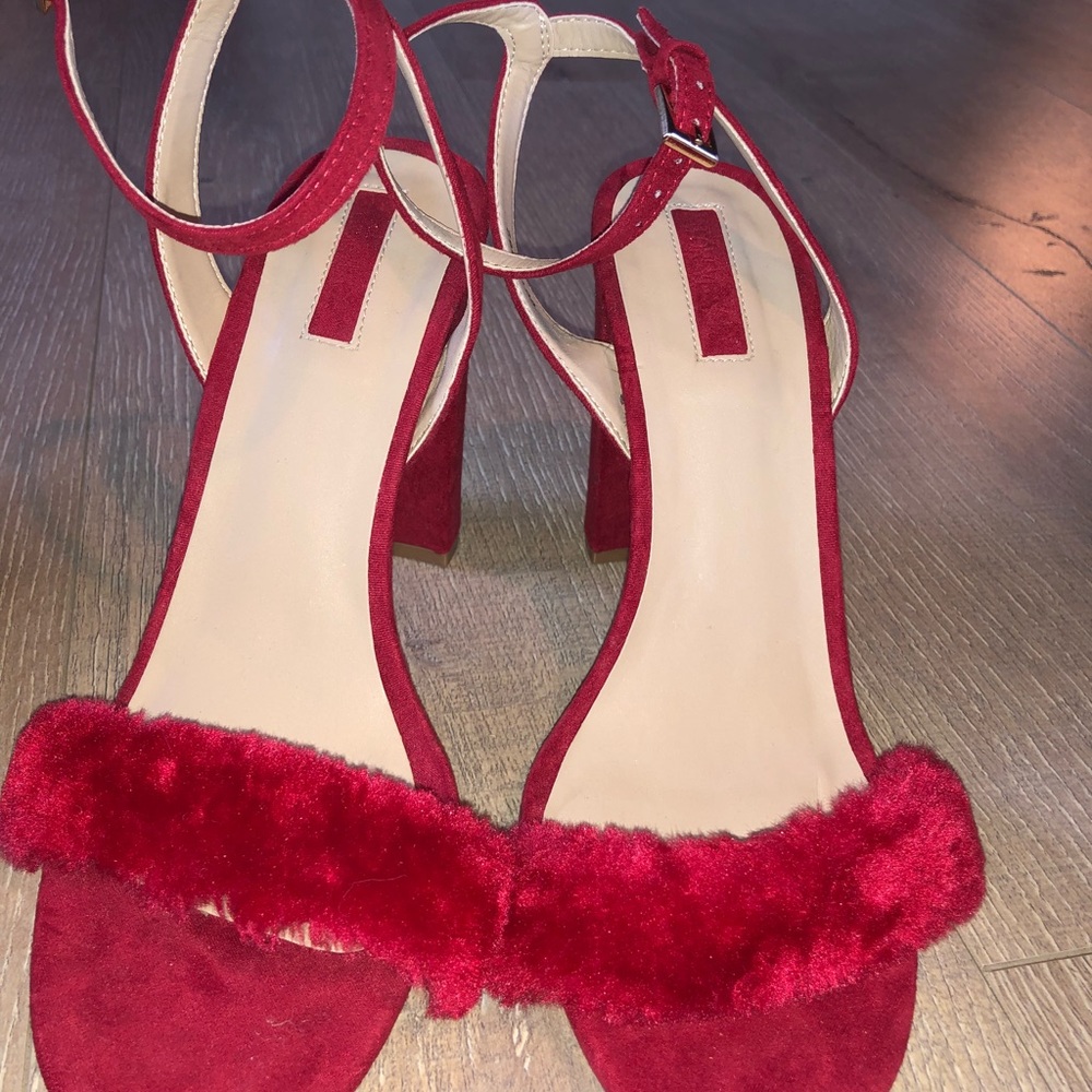 Red high heels trimmed in red fur